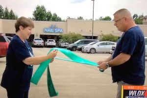 Pass Christian Mississippi Man Woman Preparing Ribbons In The News